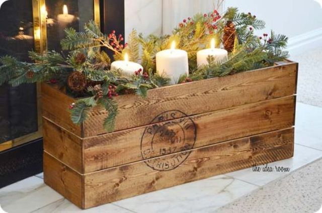 vintage crate filled with winter stuff for centerpieces and decor