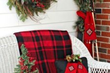 39 plaid fabric, a red crate and a traditional yet messy wreath