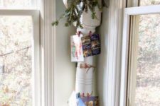 41 old house column tied up with string for ahnging pictures and cards