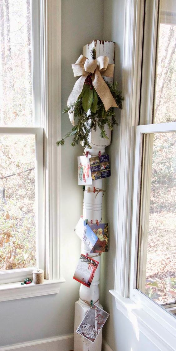 old house column tied up with string for ahnging pictures and cards