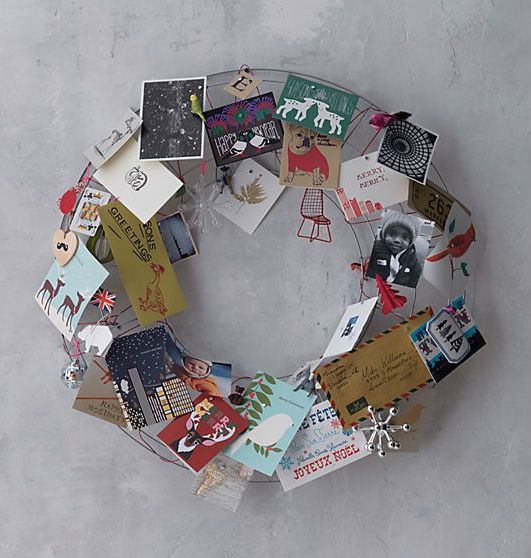 take a wire wreath form to attach cards you get