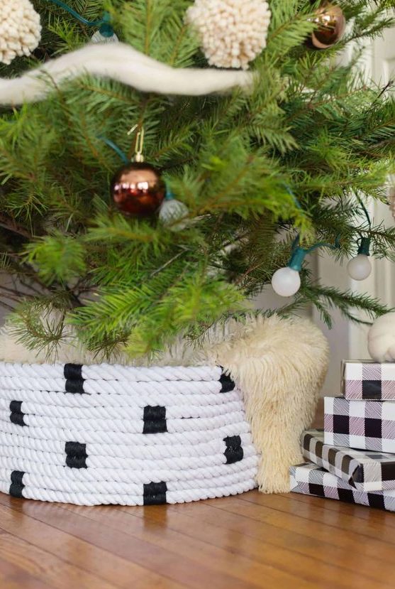 a black and white rope Christmas tree collar covered with faux fur can be DIYed to make your tree cooler