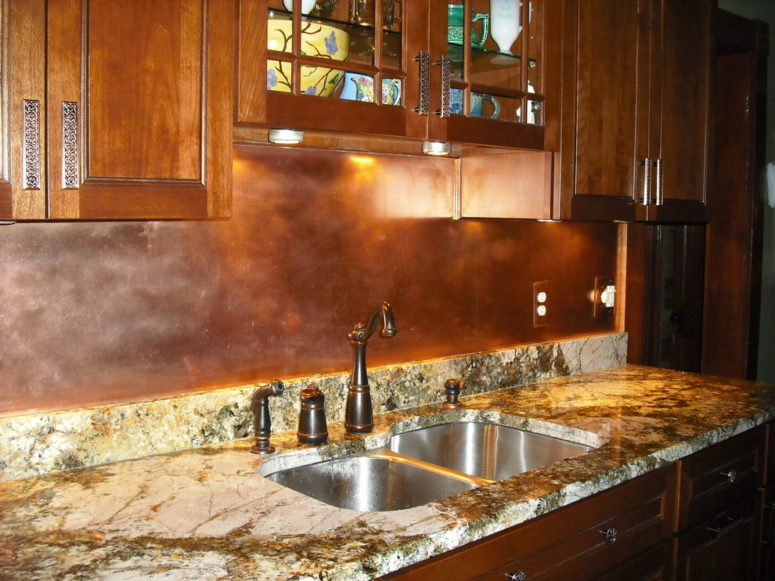 copper backsplashes works in farmhouse-style kitchens too