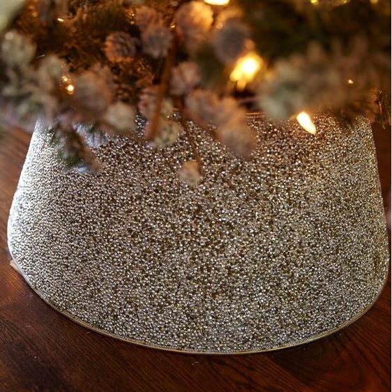 toast to a holiday season with plenty of shimmer and shine, add a dazzling beaded tree collar to make the tree stand out