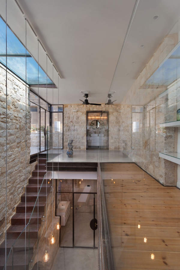 This unique home is a conversion of an old stone one with the use of modenr materials and decorations