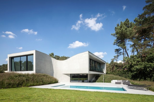 Villa MQ has a special sloping architecture that strikes from the first sight