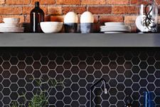 02 black hex tile backsplash with white grout and exposed red brick to make your kitchen stand out