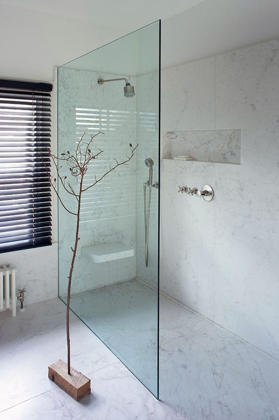 chic modern shower that seems one space with the bathroom