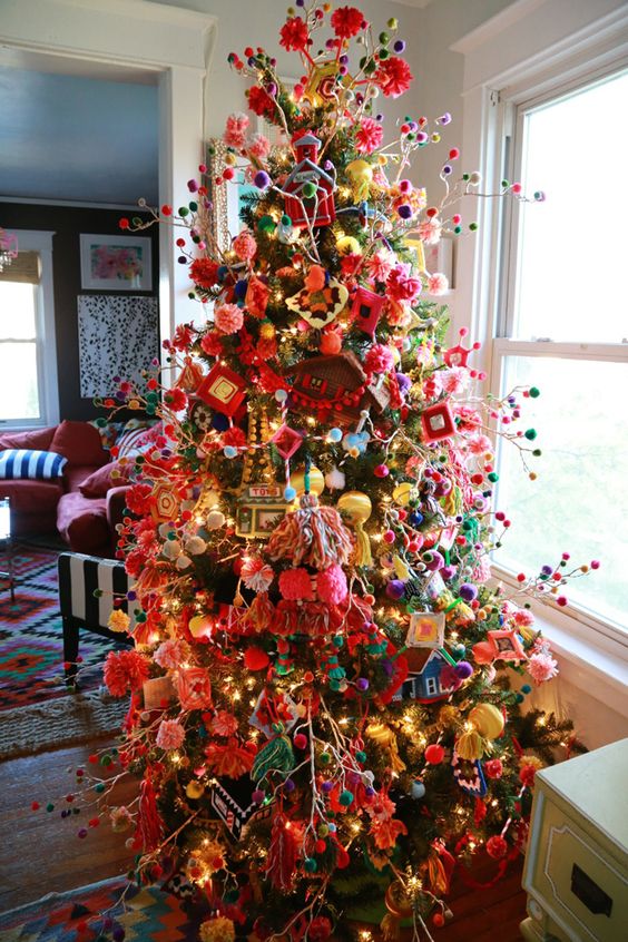 Colorful boho chic Granny styled tree wiht pompoms