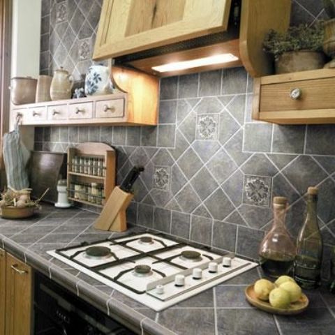 grey porcelain tiles on the countertop and backsplash