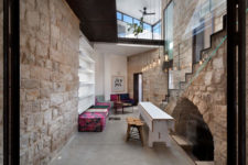 03 Glass and concrete used with ancient stone makes this house stunning and very eye-catching
