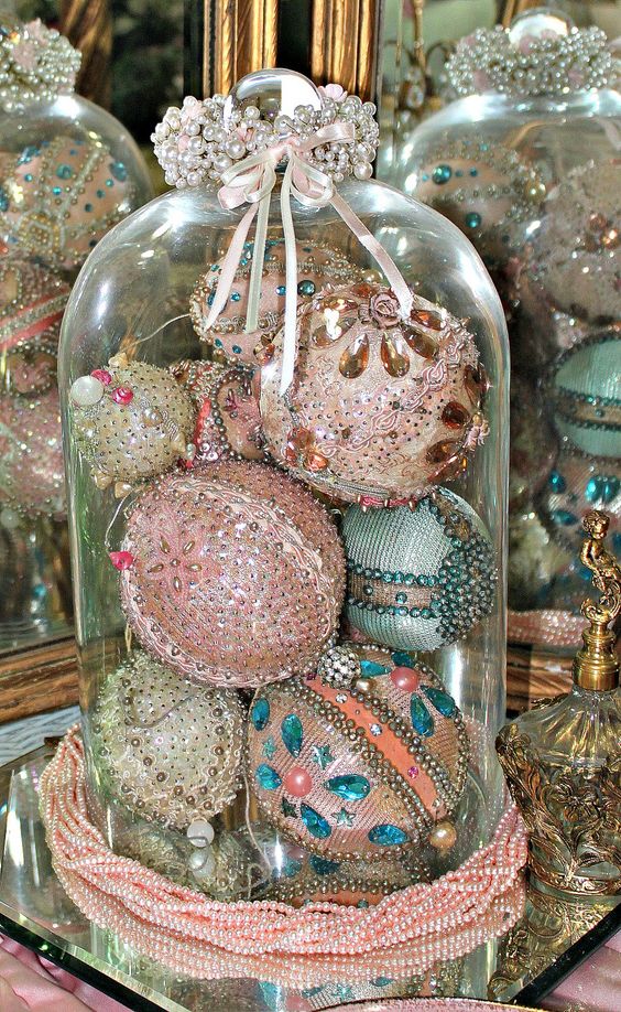 beaded, sequined and sparkled vintage ornaments in a cloche