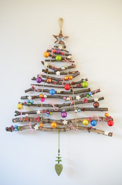 stick wall Christmas tree with colorful ornaments