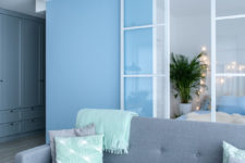04 The storage space was made in closed pale blue wardrobes and cabinets to avoid cluttering the space