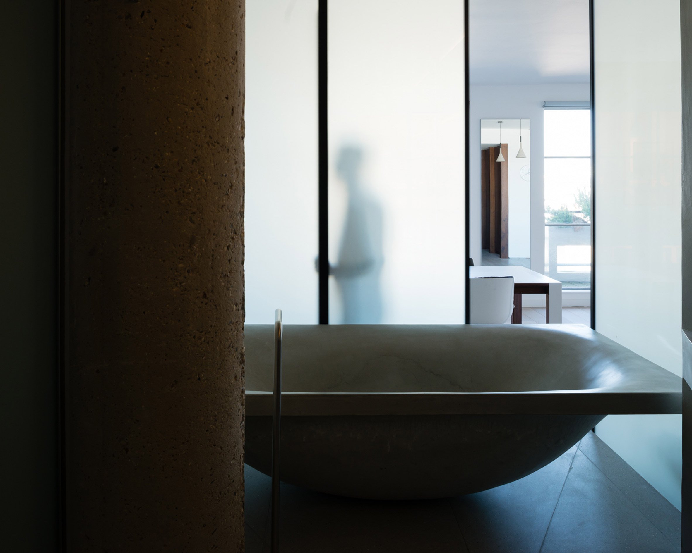 This is the unique sculptural bathtub, which is the focal point of the whole apartment