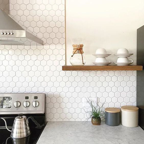 a white hex tile backsplash will easily give style to your kitchen