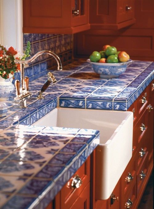 Blue chinoiserie tiles to contrast with warm colored furniture