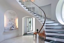 04 elegant glass balustrade with a wooden handrail