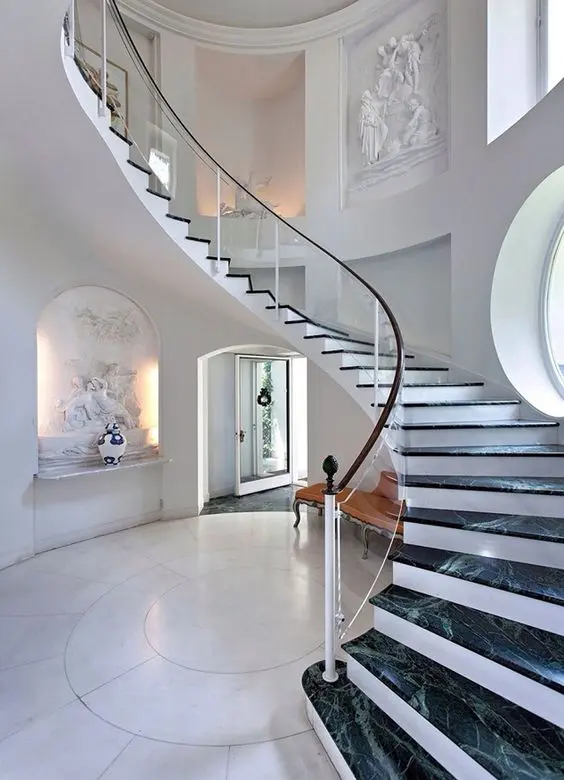 elegant glass balustrade with a wooden handrail