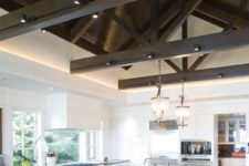 04 large kitchen with dark wooden beams and track lights