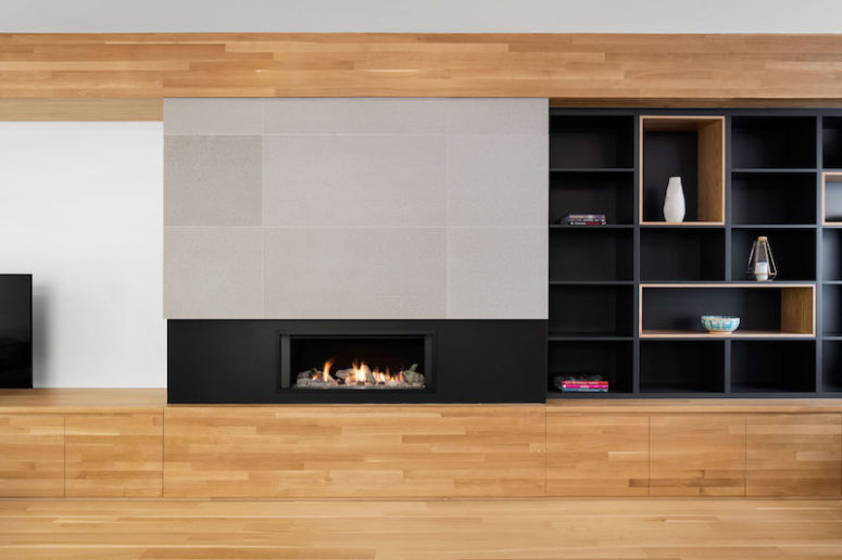 A built-in fireplace makes the decor even more welcoming, warm and comfortable