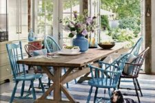 06 place your wooden picnic table and mismatched chairs next to the doors to outdoors