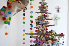 06 stick Christmas tree and taxidermy decorated with colorful pompoms