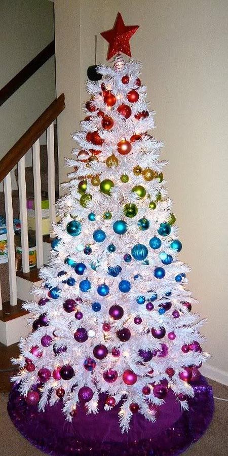 such colorful ornaments look amazing on a crispy white tree and stand out even more