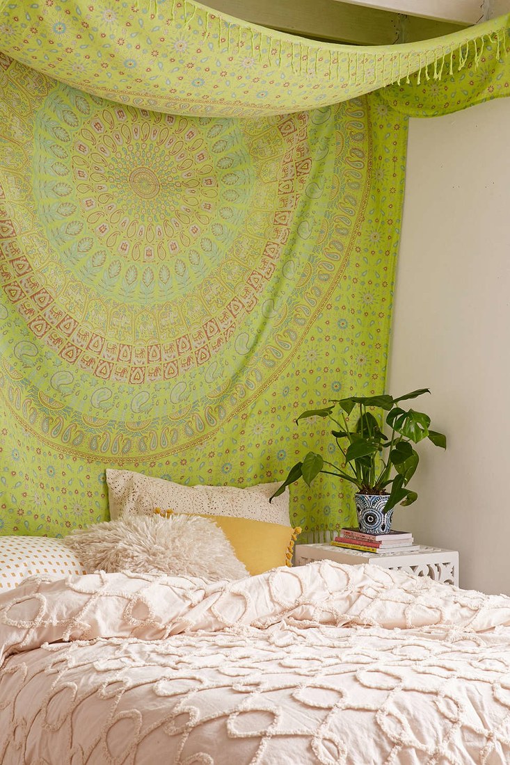 ethnic blanket instead of a headboard in your bedroom