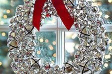 07 silver jingle bells wreath with a red bow
