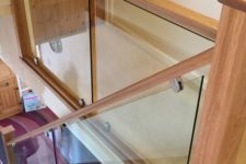 07 wooden handrail with a glass balustrade