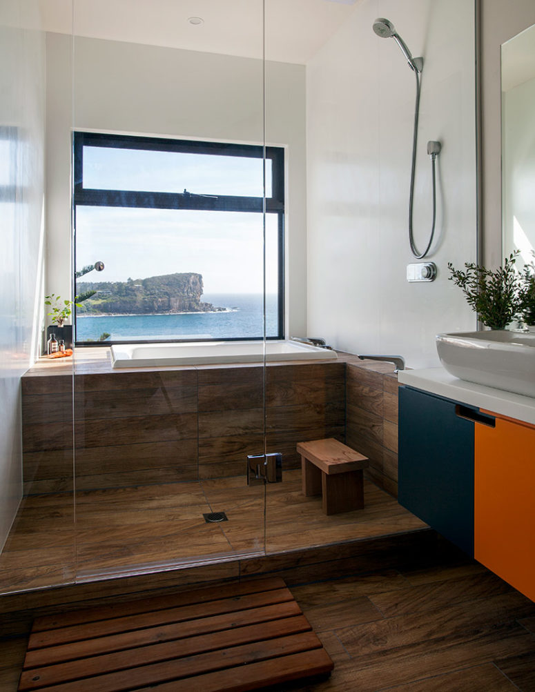 Each space gets most of the ocean views like this bathroom