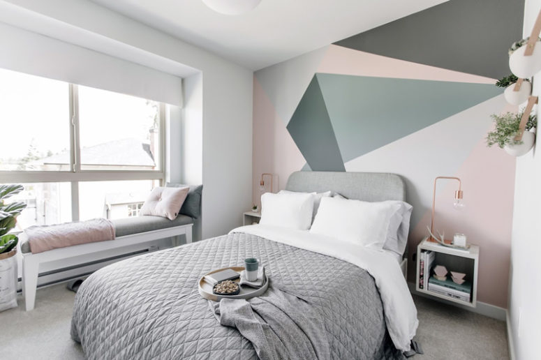 Another bedroom has an accent headboard wall with geometric shapes and a cozy windowsill bed for enjoying the views