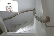 09 driftwood branches for handrails will give your stair a beach feel