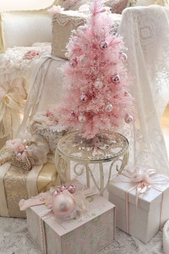 pink, blush and gold Christmas display with a tree and gifts