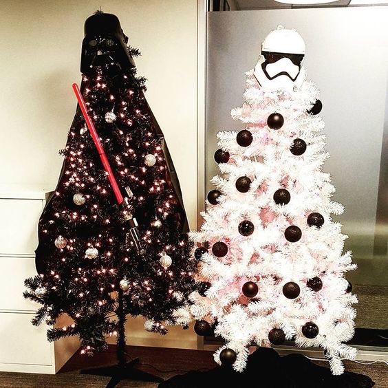 black Darth Vader tree with a lightsaber and a white Storm Trooper tree with black ornaments