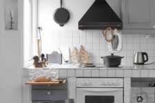 10 retro Scandinavian kitchen with white tiles and grey grout