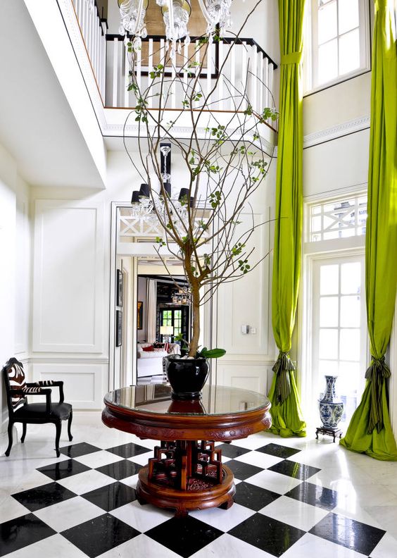 highlight your double height windows with lime green curtains