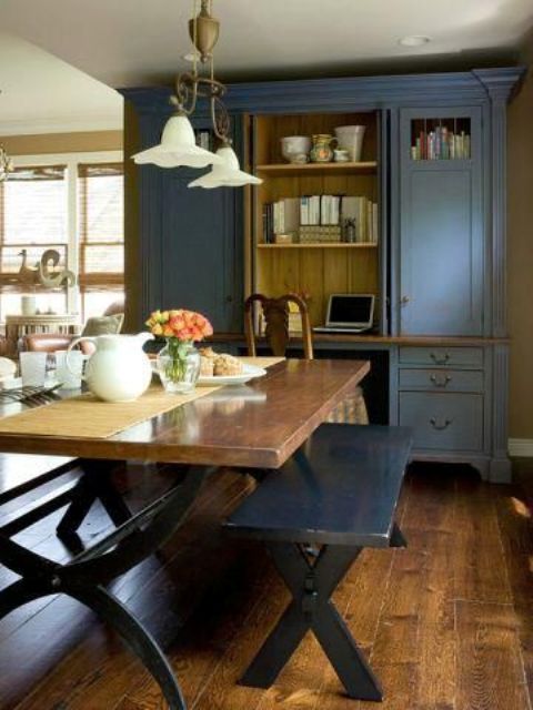 rustic dining area with a stained and polished table and benches