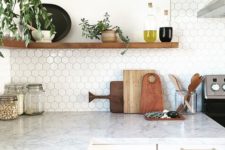 12 marble countertop and small hex tile backsplash