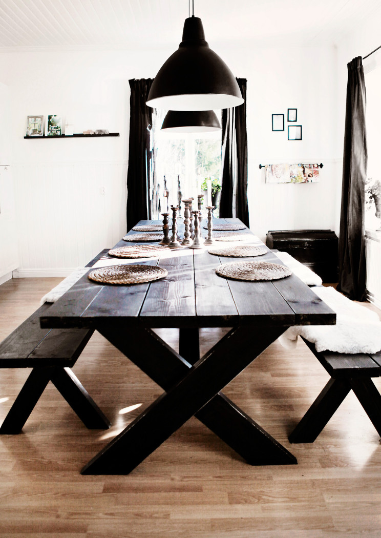 Rustic dining area with dark stained furniture