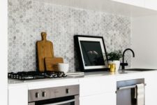 13 marble grey backsplash contrasts with pure white cabinets