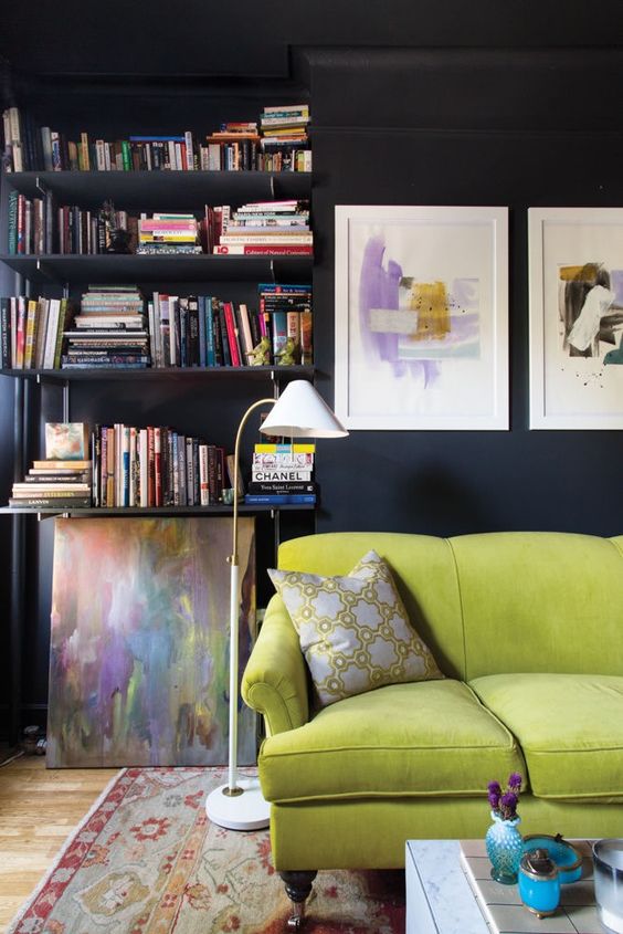 a moody living room with a lime green sofa