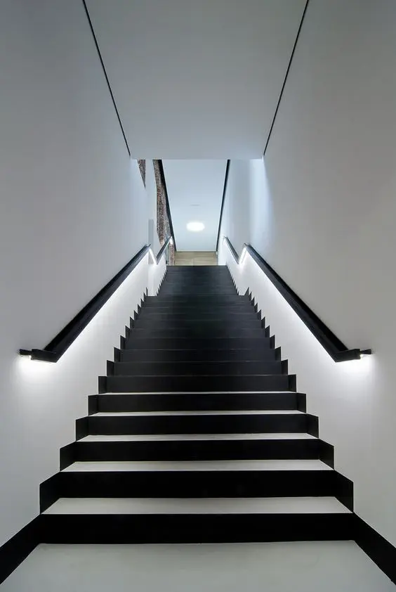 lit up handrails look modern and let you not turn on other lights