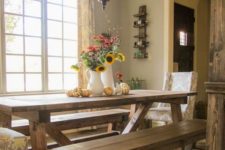 15 rustic stained wooden table and benches are ideal to add a cozy touch
