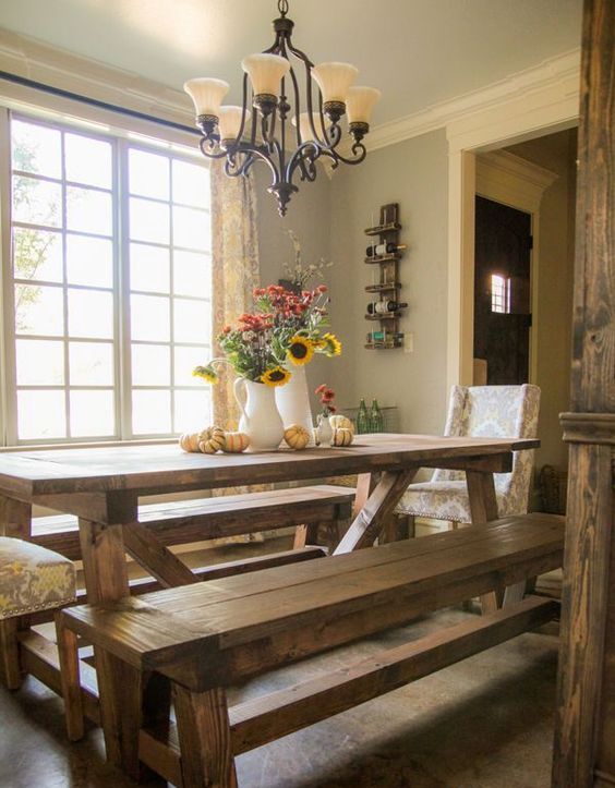 rustic stained wooden table and benches are ideal to add a cozy touch