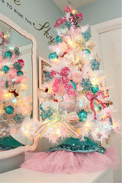 colorful pink and turquoise ornaments and lights