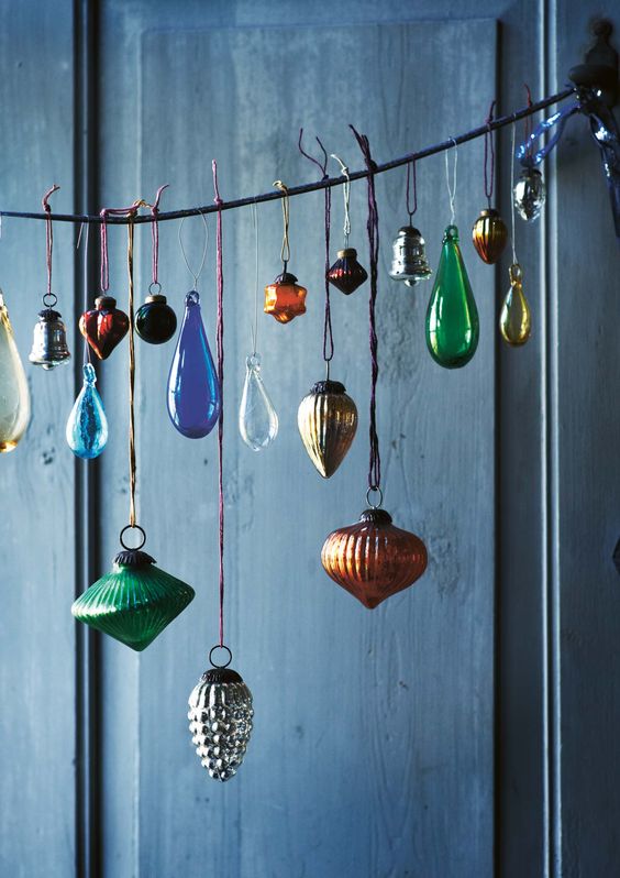 even if you don't have a tree, you can still display bold vintage ornaments in a beautiful way