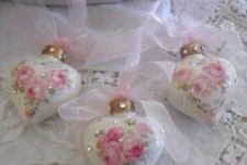19 rose and rhinestone heart-shaped ornaments with pink ribbon