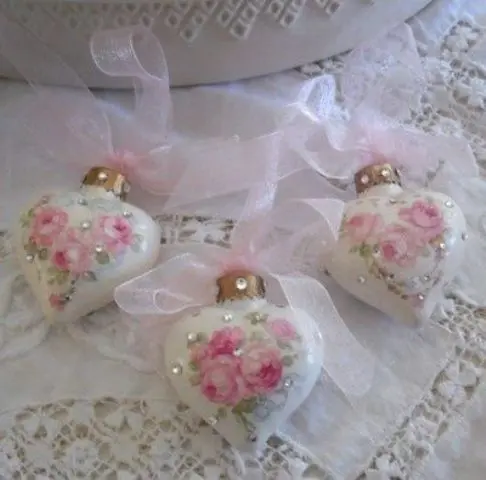 Rose and rhinestone heart shaped ornaments with pink ribbon